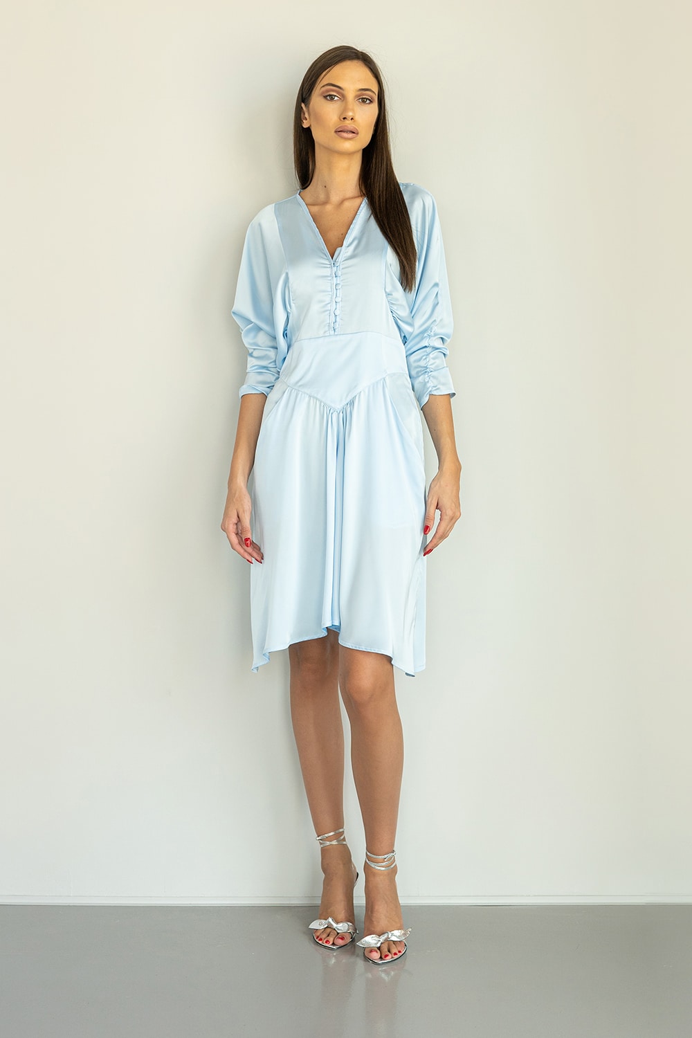 Light blue satin mini dress with balloon sleeves and buttons